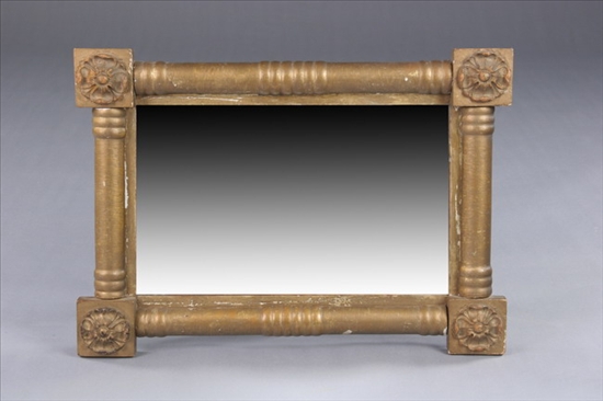 Appraisal: AMERICAN EMPIRE GILTWOOD WALL MIRROR Floral medallion corner blocks applied