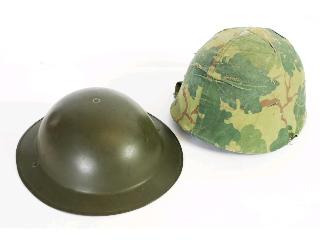 Appraisal: AMERICAN MILITARY HELMET with plastic inner liner having woven fabric