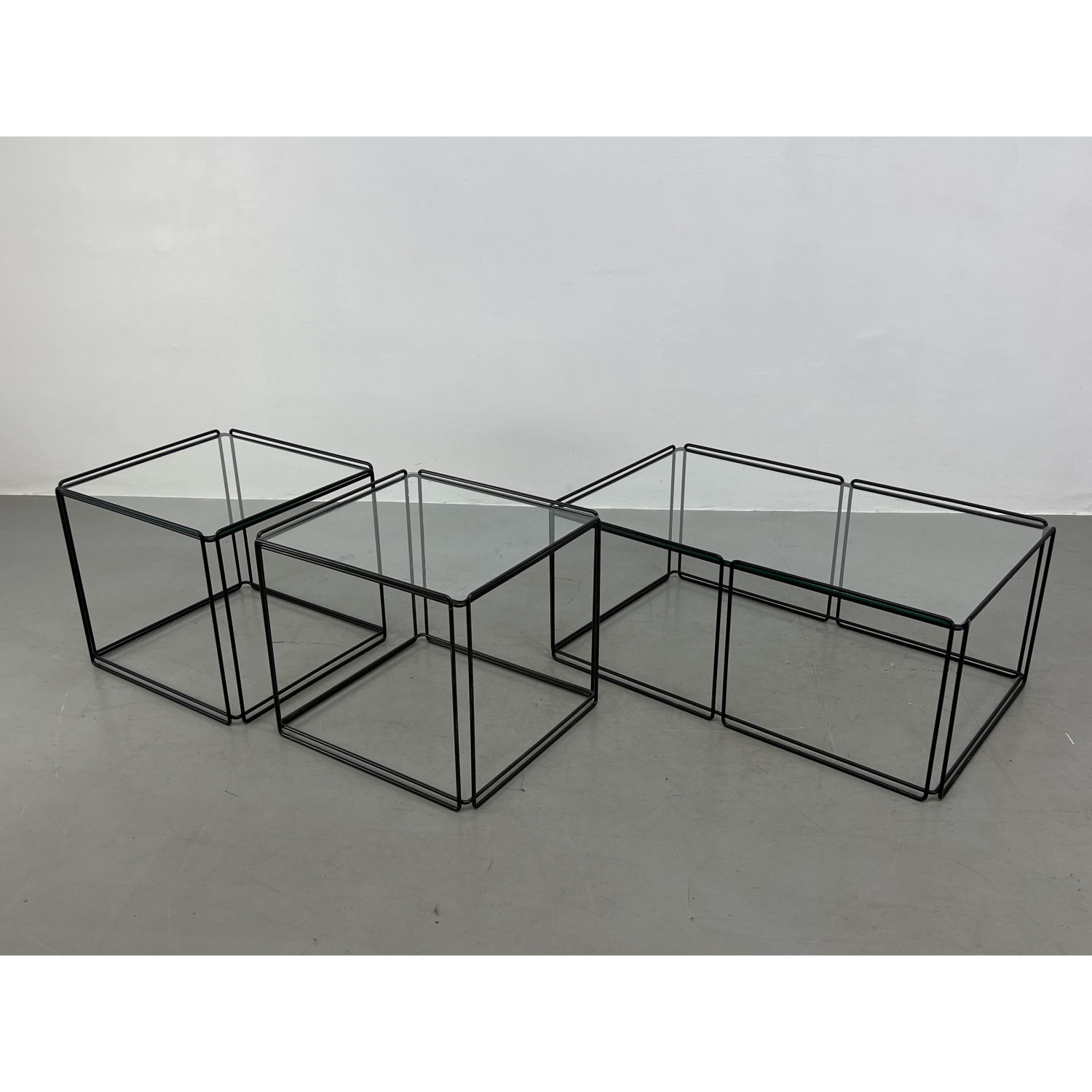 Appraisal: Max Sauze Isosceles Coffee and end Tables Iron and glass