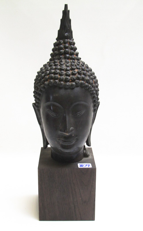 Appraisal: THAI BRONZE BUDDHA HEAD cast with snail shell curls elongated