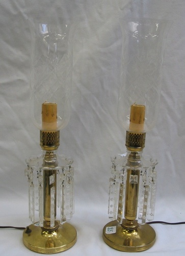 Appraisal: PAIR OF ELECTRIFIED HURRICANE LAMPS the brass bases supporting engraved