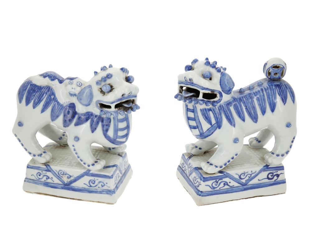 Appraisal: A pair of Chinese porcelain guardian lions th Century Each