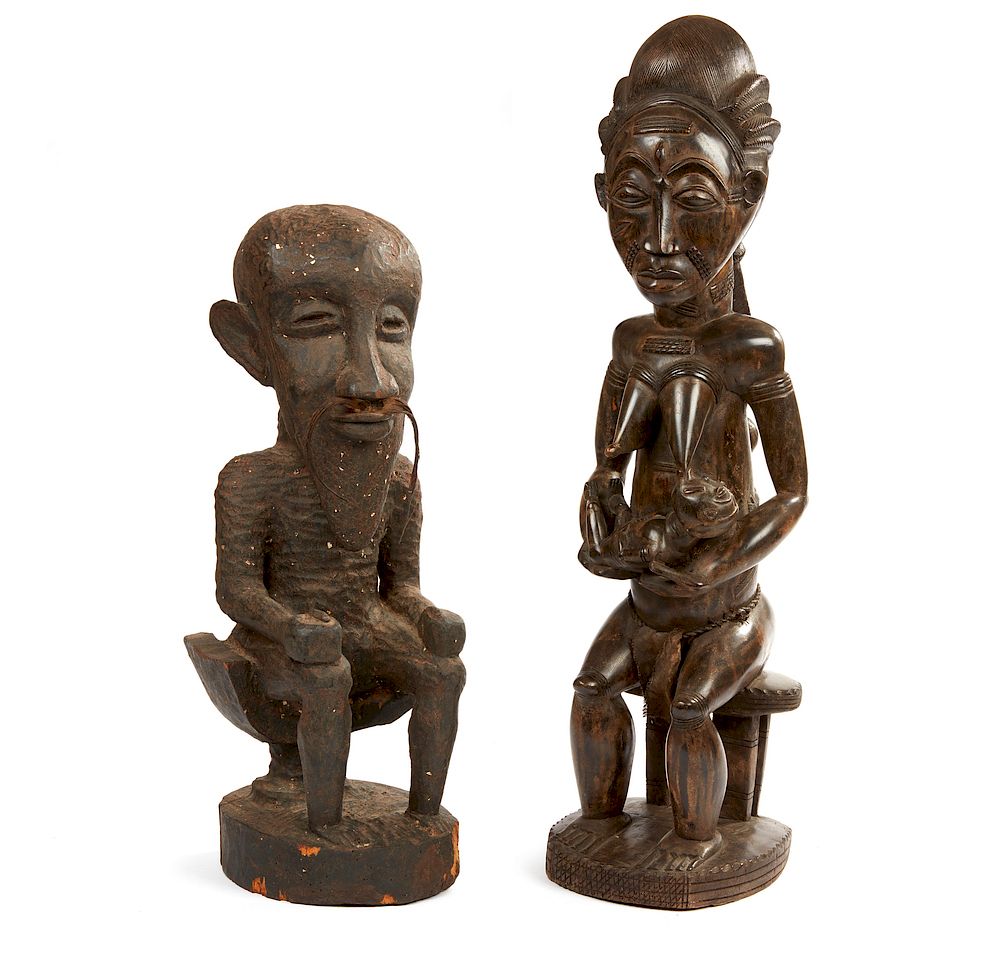 Appraisal: Two African Wood Figures Two large carved wood figures comprising