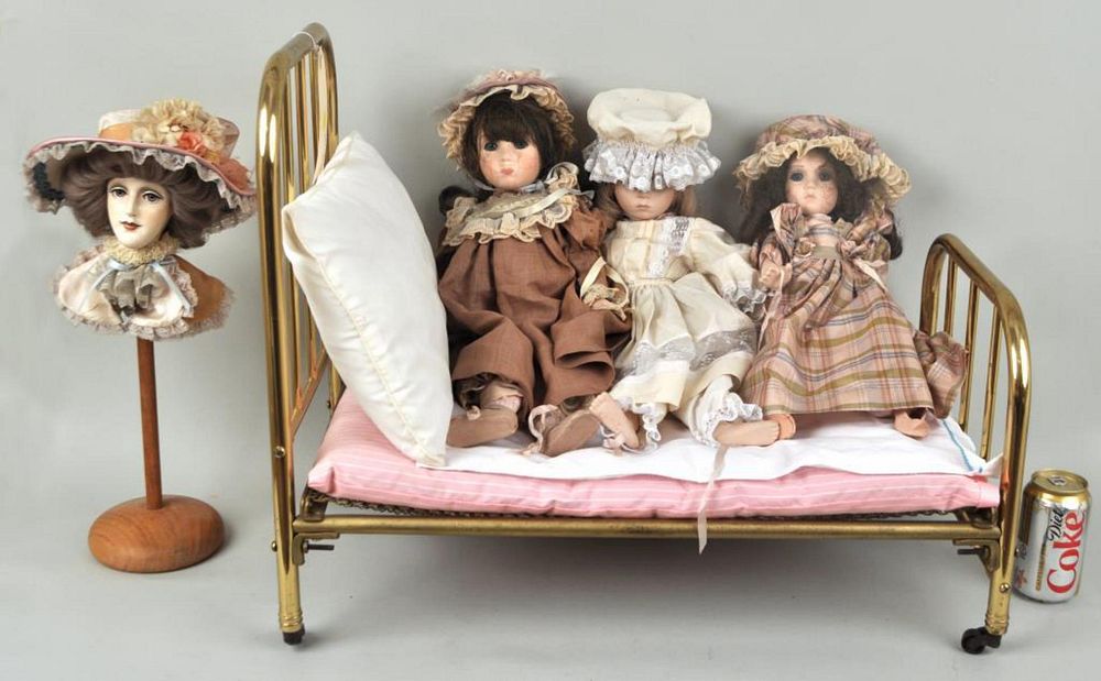 Appraisal: Group Four Dolls Miniature Brass Bed comprising three Lenox dolls