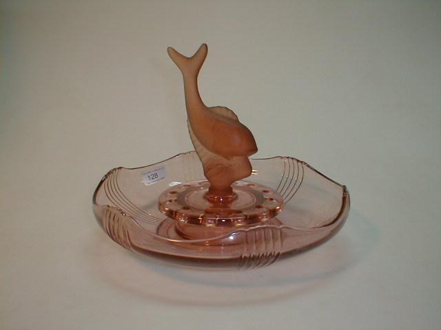 Appraisal: A 's salmon pink glass centrepiece with central model of