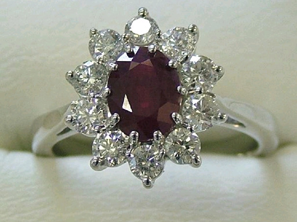 Appraisal: ct white gold oval ruby and diamond cluster ring gm