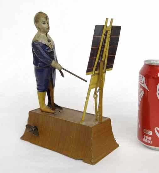 Appraisal: C German ''Boy With Blackboard'' tin toy signed ''Tipp Co