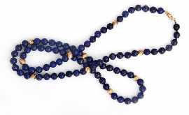 Appraisal: An mm diameter lapis lazuli bead necklace with eleven ct