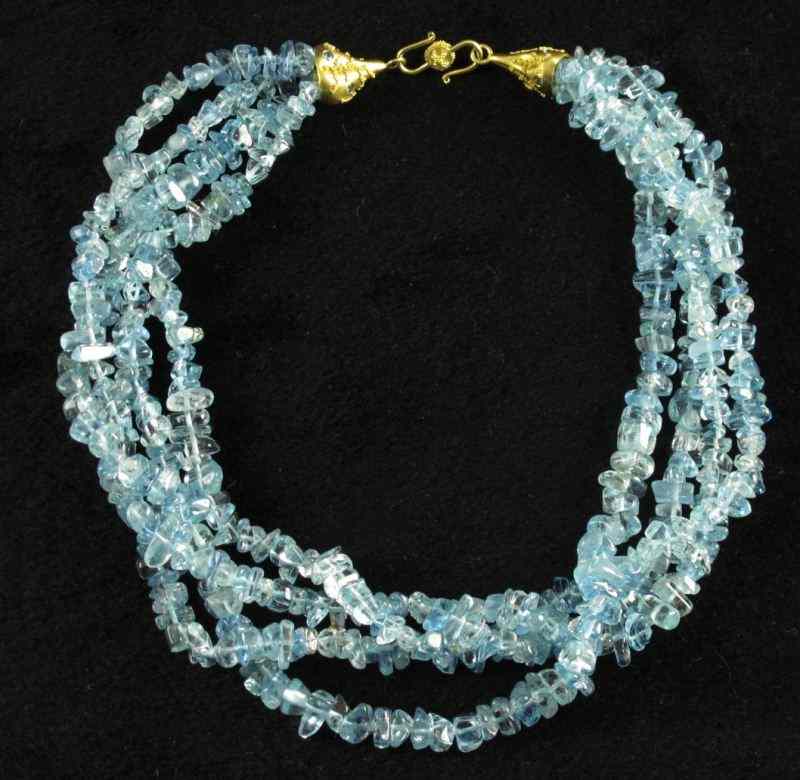 Appraisal: Gold and Aquamarine Necklaceartist signed by ''Tomi'' designed as a