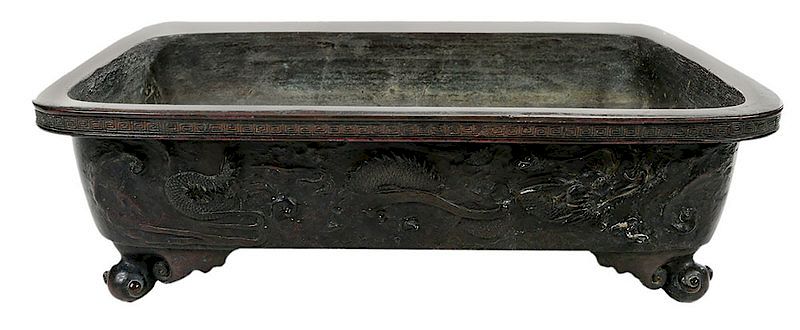 Appraisal: Chinese Bronze Footed Planter probably Qing dynasty rectangular shaped with