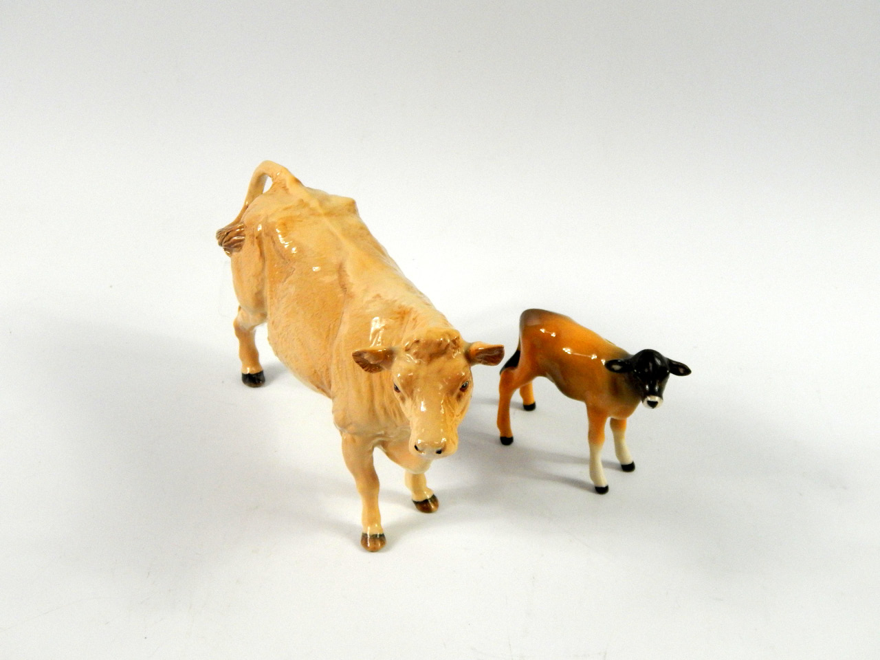 Appraisal: A Beswick figure of a Jersey cow together with a