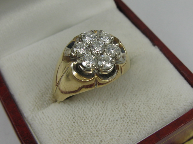 Appraisal: DIAMOND AND K YELLOW AND WHITE GOLD RING set with