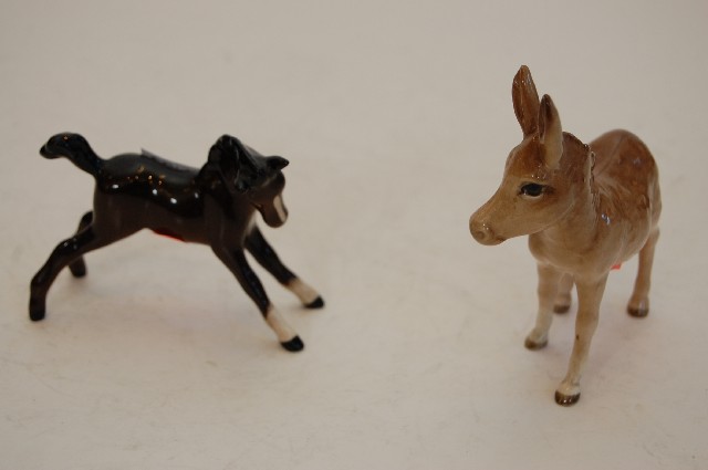 Appraisal: BESWICK FOAL DONKEY FIGURES