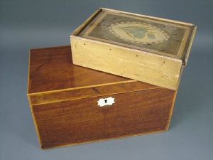 Appraisal: A George III mahogany tea caddy fitted with two lidded