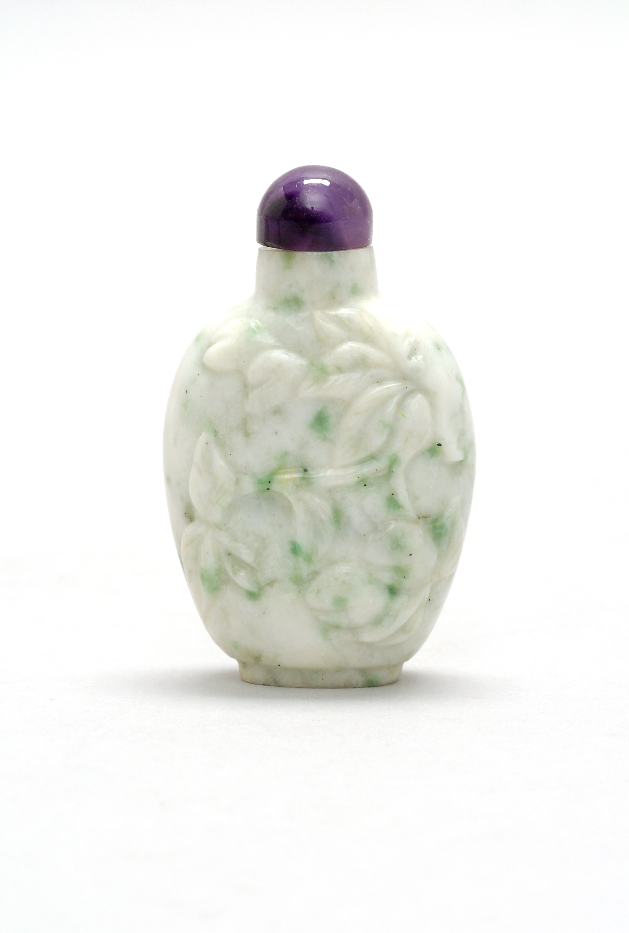 Appraisal: GREEN AND WHITE JADE SNUFF BOTTLE Early th CenturyIn spade