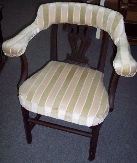 Appraisal: A mahogany armchair with pierced splat back