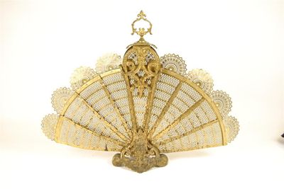 Appraisal: A French gilt brass fan firescreen in cm h in