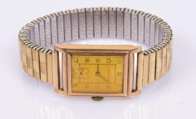 Appraisal: A gentleman's ct gold cased Waverly tank wristwatch in a