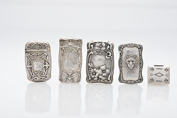 Appraisal: STERLING AND SILVER MATCH SAFES American th and th century