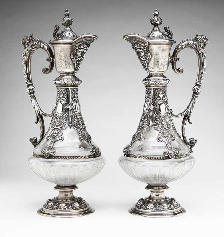 Appraisal: A pair of German Renaissance Revival silver-mounted etched glass ewers