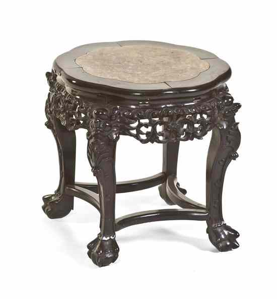 Appraisal: A Chinese Carved Hardwood Stool having a lobed circular marble