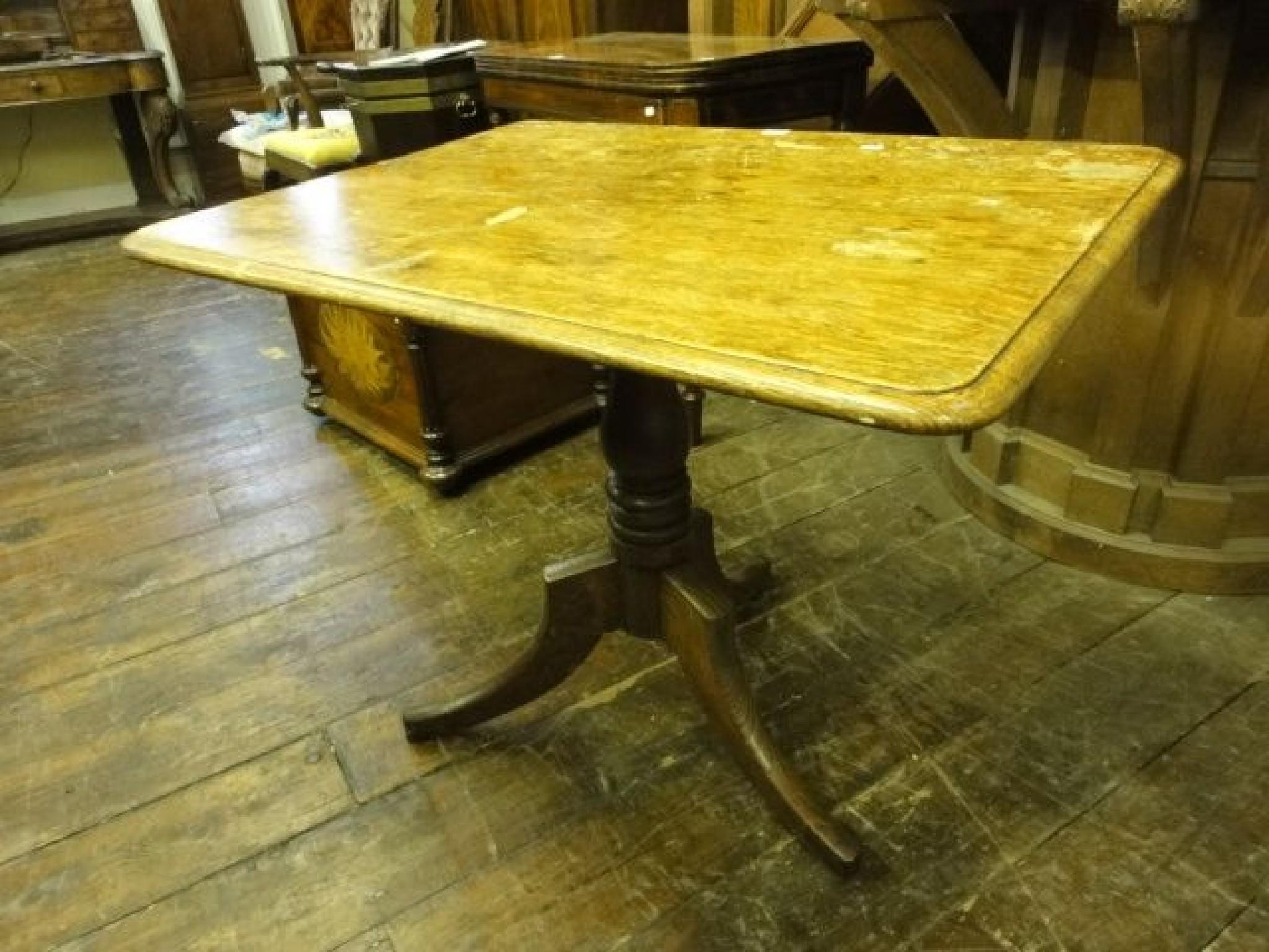 Appraisal: A th century oak tilt top occasional table of rectangular