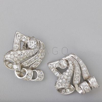 Appraisal: PAIR OF DIAMOND PLATINUM FUR CLIPS Designed as asymmetrical volutes