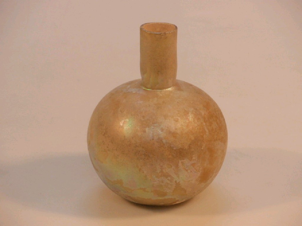 Appraisal: A light yellowish-green late Roman glass flask the funnel neck