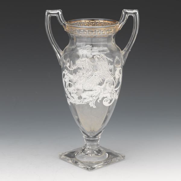 Appraisal: AMERICAN GLASS VASE WITH GRIFFIN x Molded glass urn-shaped vase