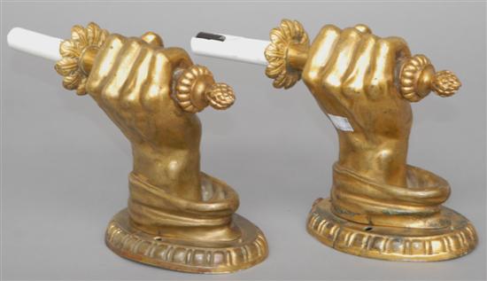 Appraisal: PAIR ANTIQUE BRONZE HAND FORM SCONCES Each having candle holder