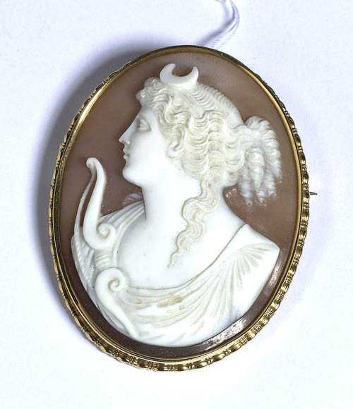 Appraisal: SHELL CAMEO BROOCH ca Yellow gold Fine oval-shaped shell cameo