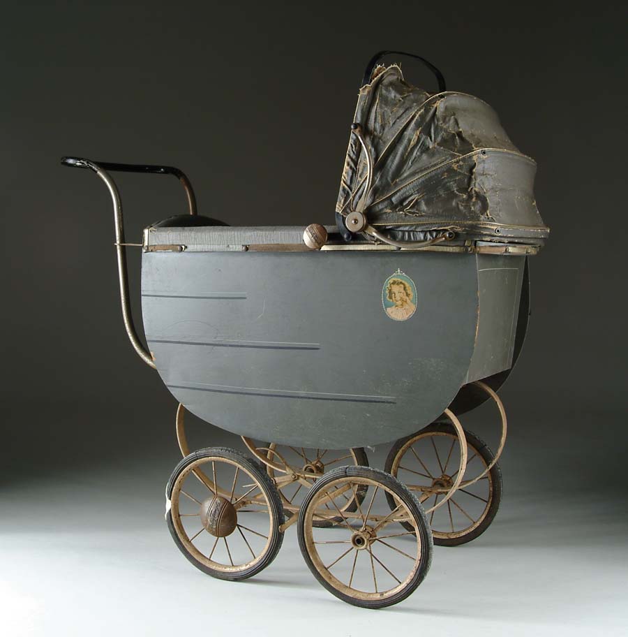 Appraisal: FANCY SHIRLEY TEMPLE STROLLER WITH CANOPY Showing lithographed vignettes of