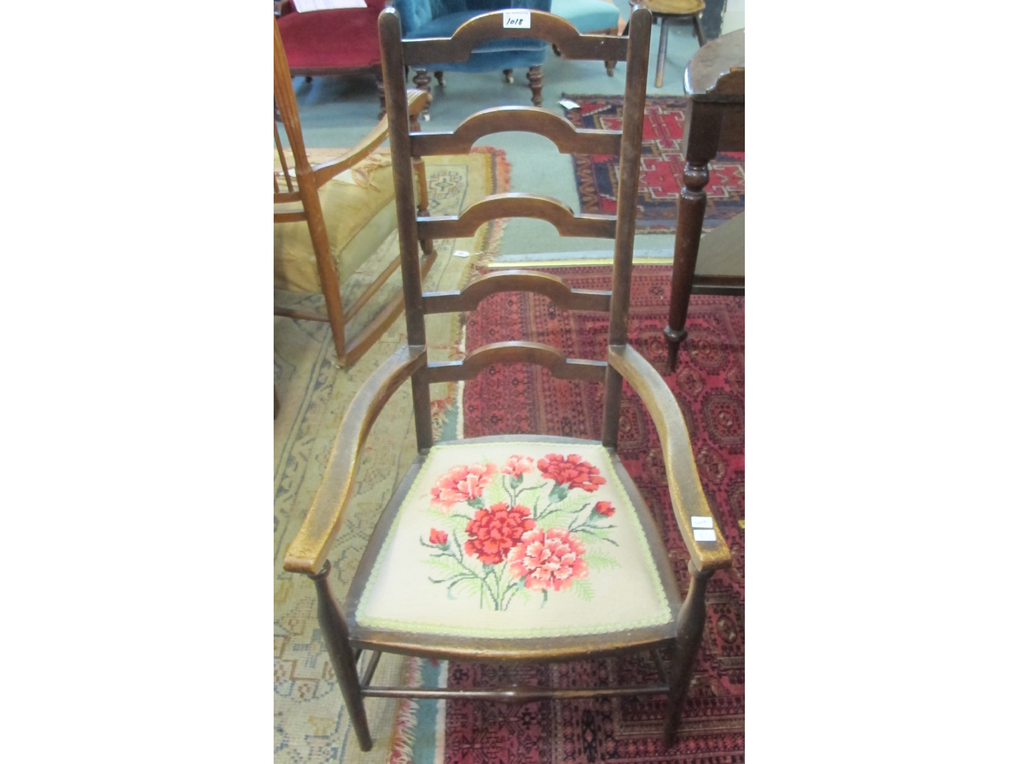 Appraisal: A mahogany ladder back chair