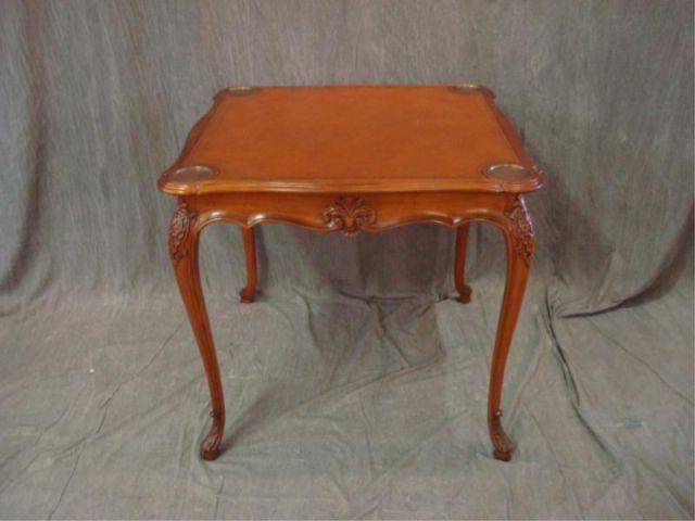 Appraisal: Leathertop Card Table with Leaf Carvings and Brass Coaster Inserts