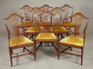 Appraisal: A set of eight mahogany shield back dining chairs early