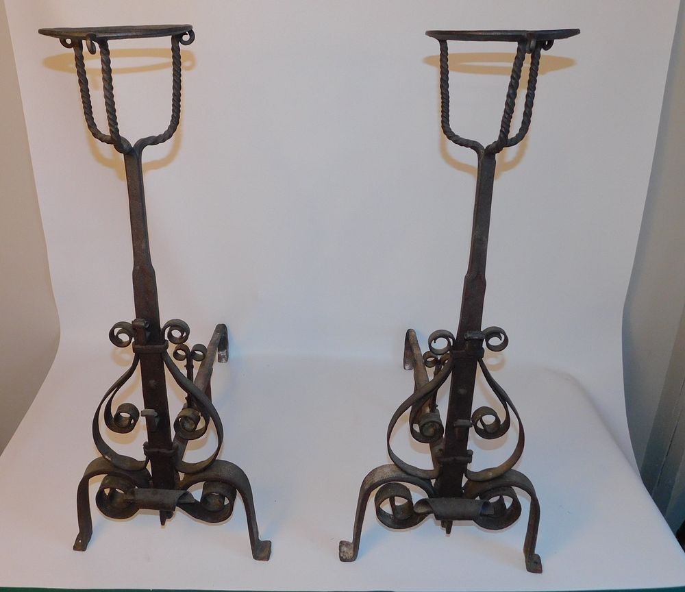 Appraisal: PAIR A C BRANDY WARMER ANDIRONS Hand wrought pair fancy