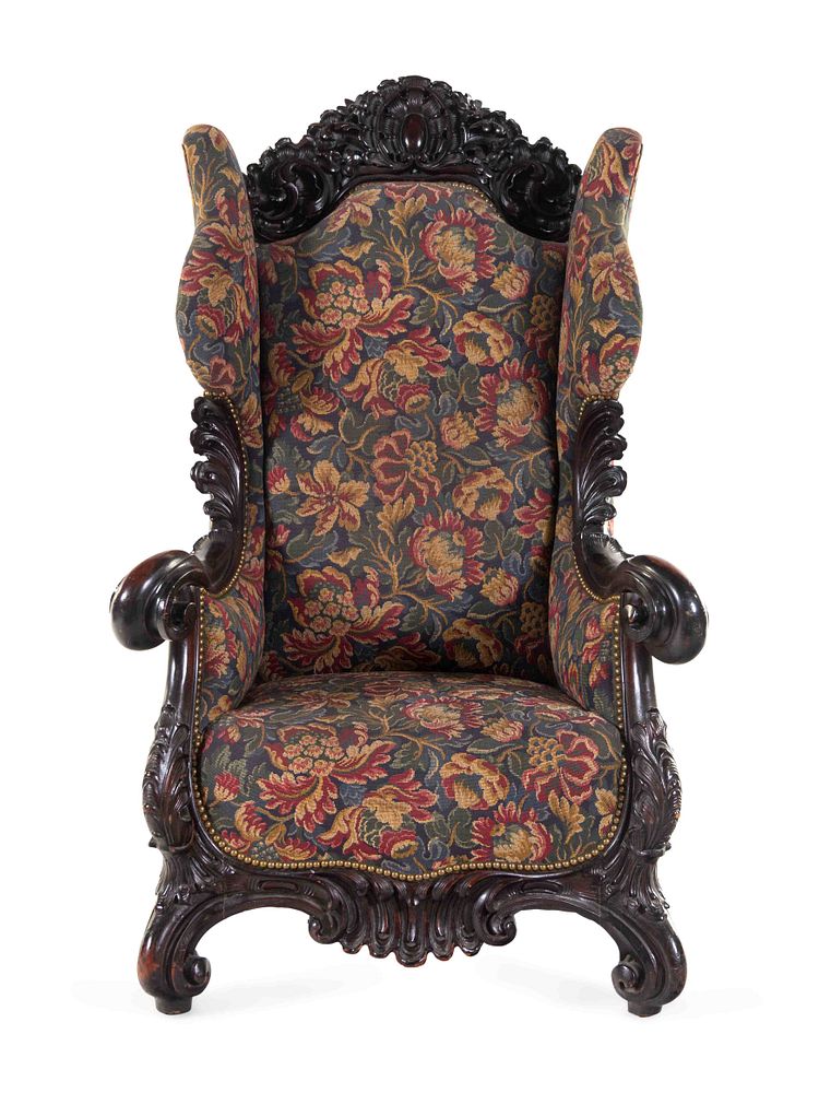 Appraisal: A Karpen Carved Mahogany Wingback Armchair A Karpen Carved Mahogany