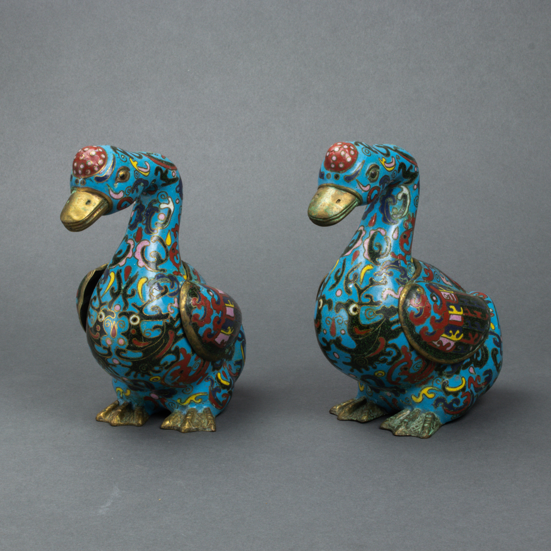 Appraisal: PAIR OF CHINESE CLOISONNE ENAMEL GOOSE-FORM VESSELS Pair of Chinese