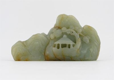 Appraisal: A Chinese jade brushrest carved as a pagoda overhung with