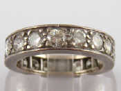 Appraisal: A white metal test carat gold diamond full eternity ring