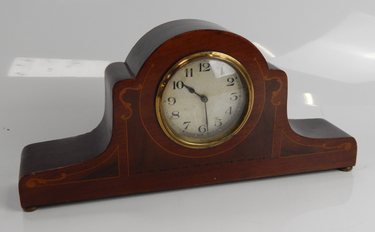 Appraisal: An Edwardian inlaid mahogany mantel clock with silvered dial and