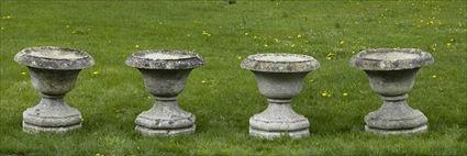 Appraisal: FOUR BATH STONE URNS x in Christie's lot This lot