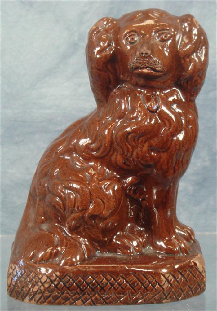 Appraisal: Glazed redware spaniel on pedestal incised script signature George Hohloch