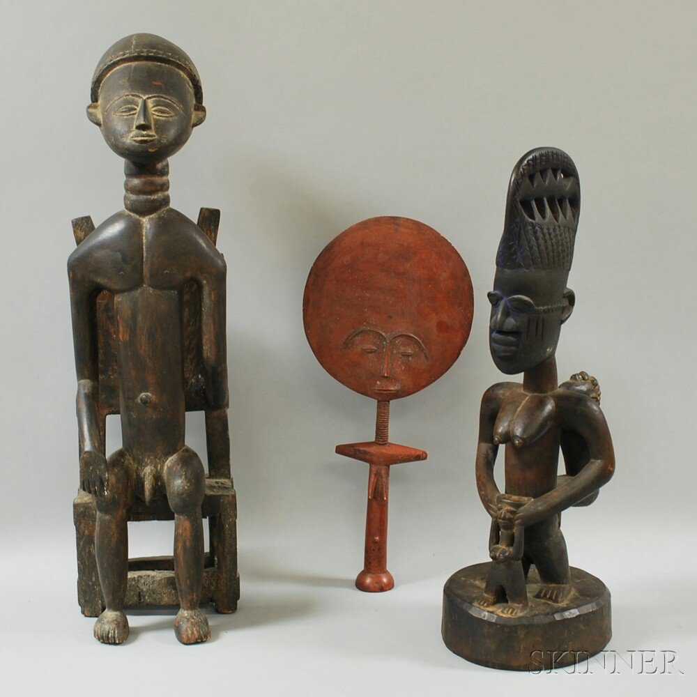 Appraisal: Yoruba-style Carved Wood Female Figure with Children together with two