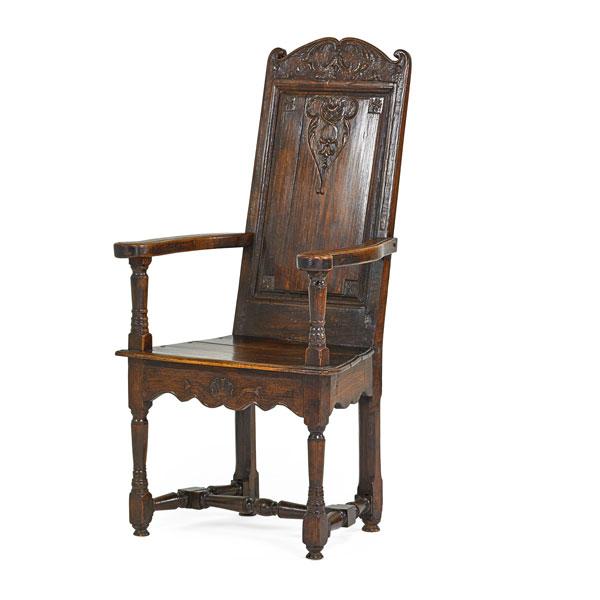 Appraisal: FLEMISH OPEN ARMCHAIR Elm paneled back carved rail and apron