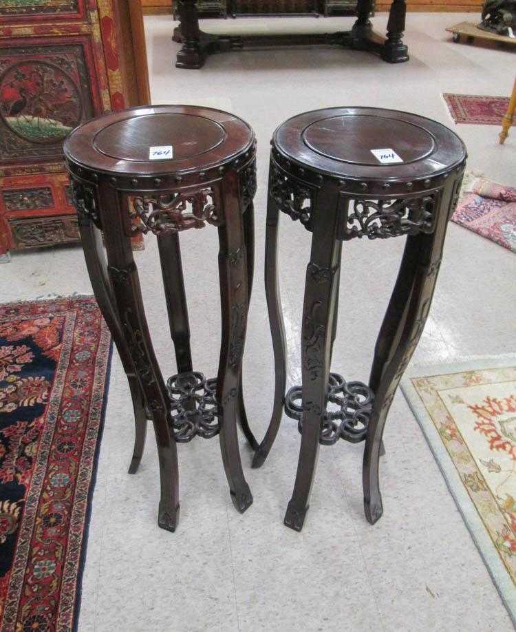 Appraisal: PAIR OF ROSEWOOD PLANT STANDS Chinese th century each having