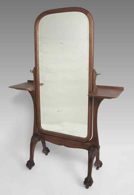 Appraisal: ANTIQUE CHEVAL MIRROR Dated Beveled looking glass in swing frame