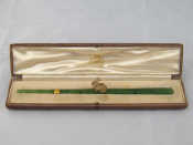 Appraisal: Asprey A fine nephrite jade letter opener with carved rock