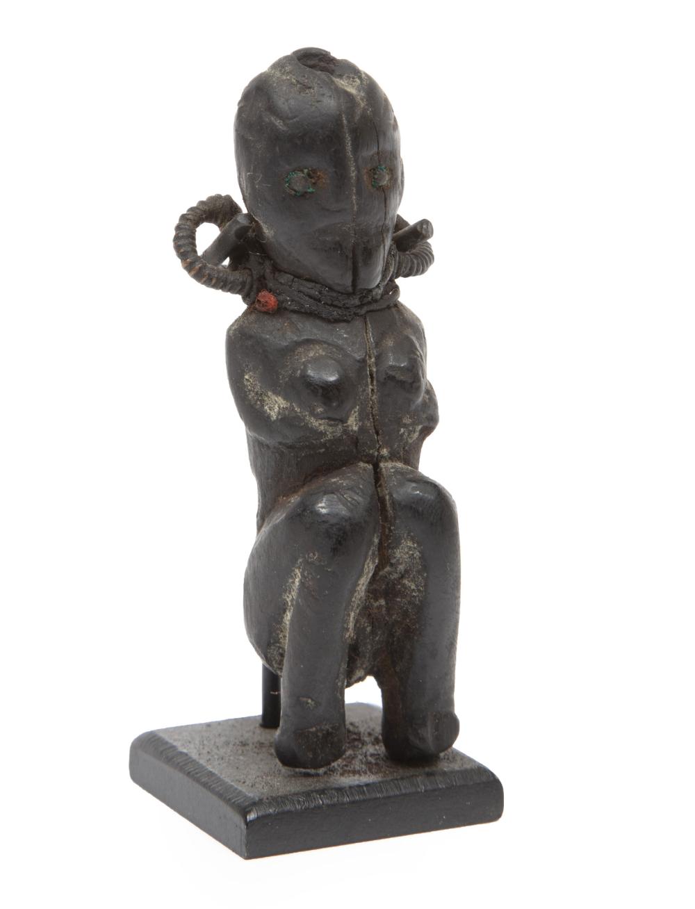 Appraisal: African Keaka Crouching Female Protective Figure Western Cameroon wood copper