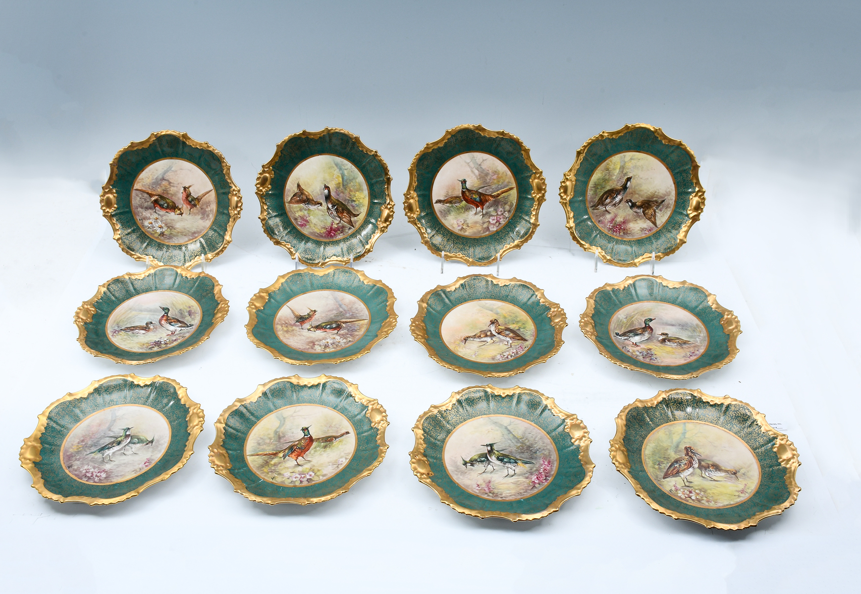 Appraisal: PC LIMOGES PORCELAIN GAME BIRD PLATES Limoges porcelain plates having